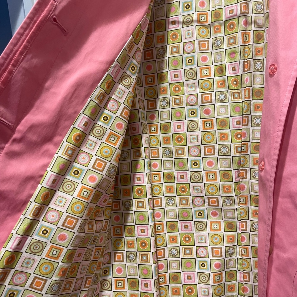 Cute pink raincoat. Never worn.